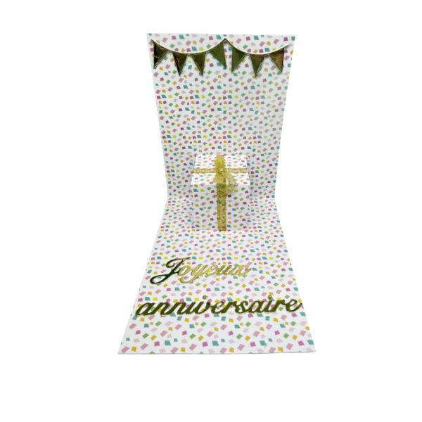 Intérieur de la carte avec un petit cadeau en 3D qui surgit (Pop-up) et confettis multicolores